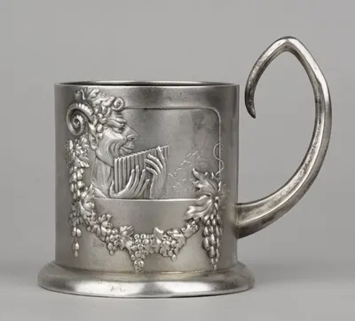 Подстаканник «Пан играющий». Россия, мастер- монограммист «ПТ», 1908-1914 годы.